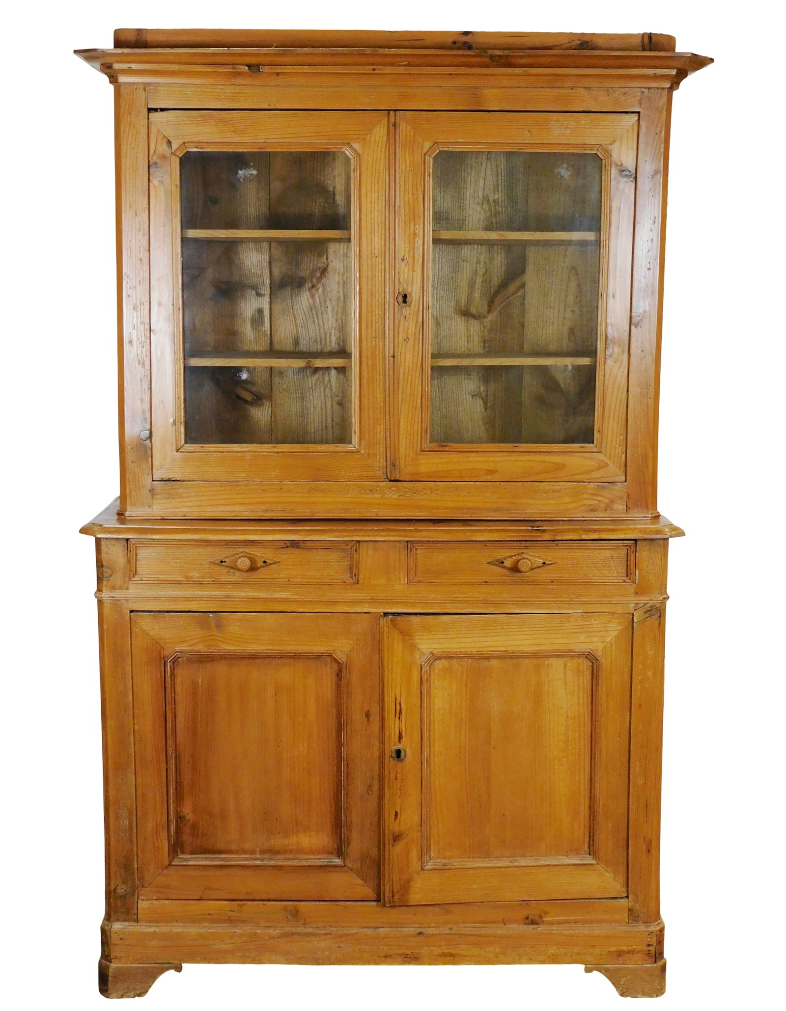 +Two-part pine cabinet, 19th C., French, upper case with projecting crest, two glazed cabinet doors, (1 of 5)