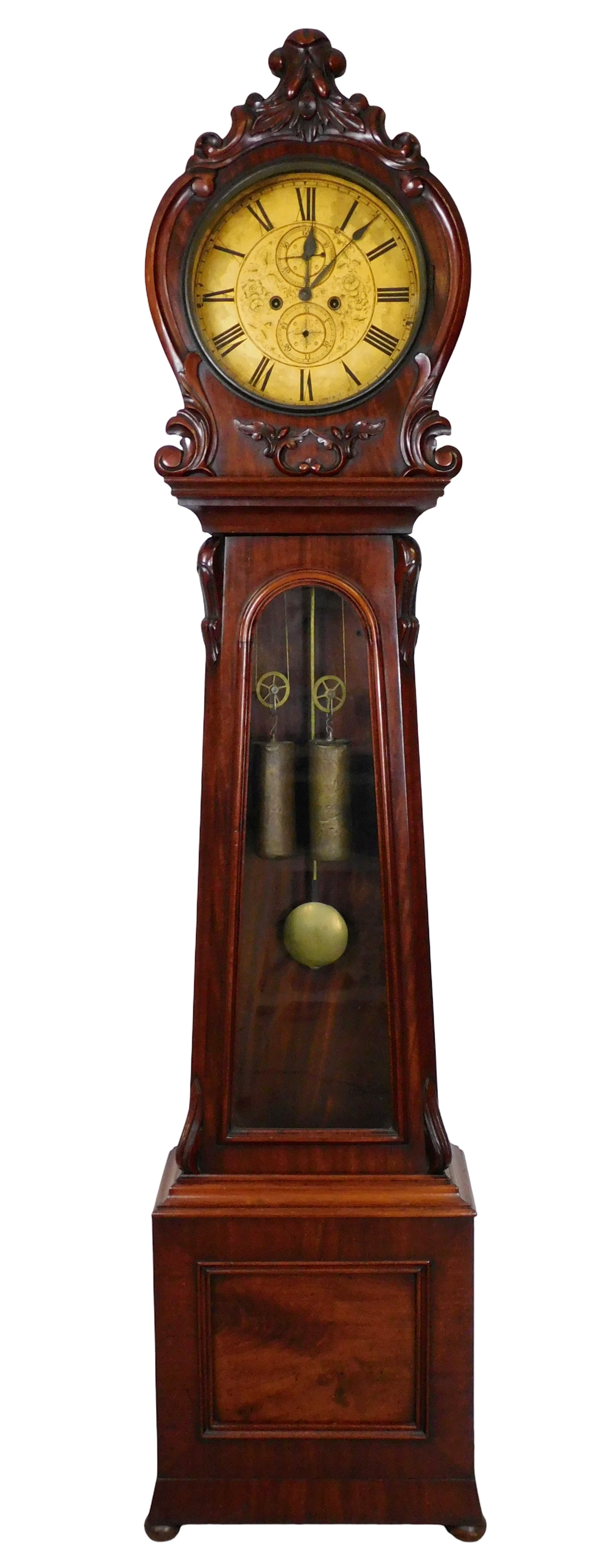 +Irish tall clock, 19th C., mahogany, carved round hood, opening to gilt dial with roman numerals, (1 of 7)