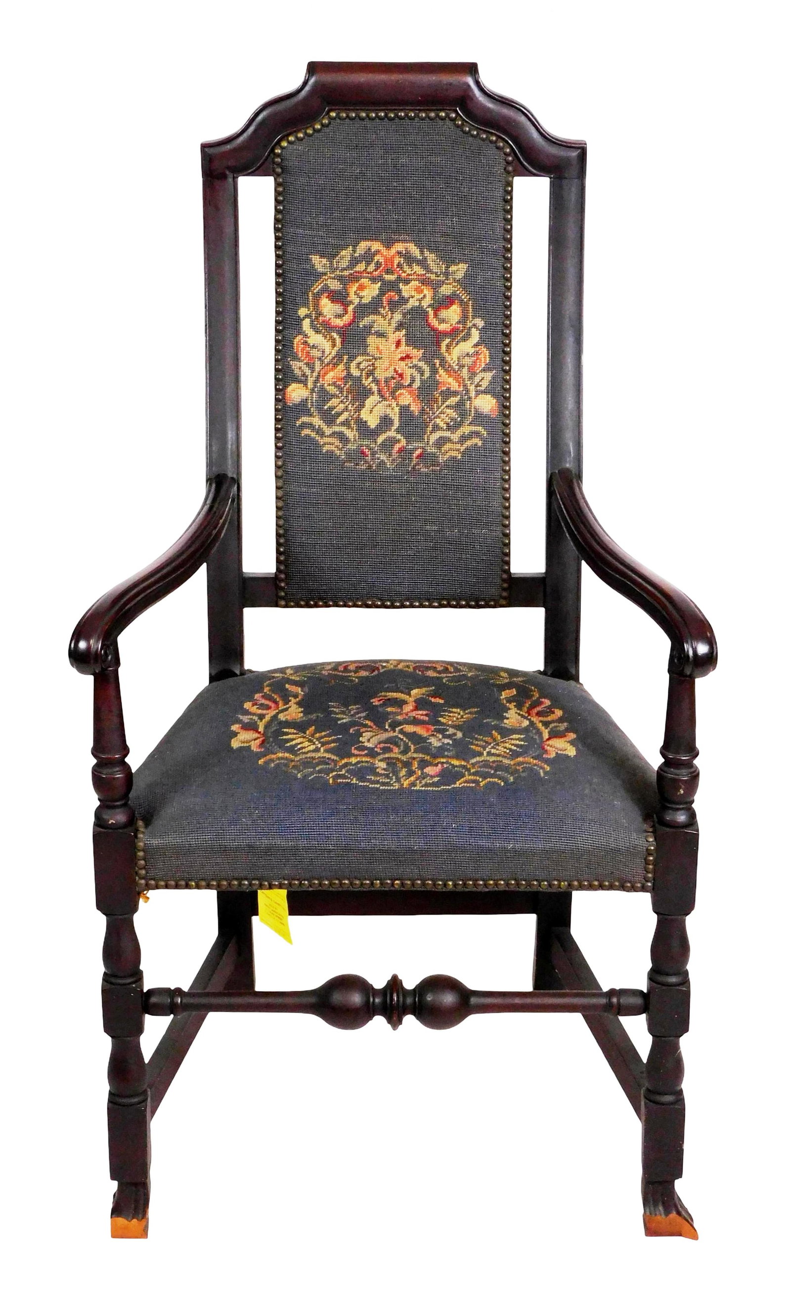 +William and Mary style armchair with needlepoint upholstery, shaped backrest and scrolled arms,: +William and Mary style armchair with needlepoint upholstery, shaped backrest and scrolled arms, turned stretcher connecting front legs terminating on Spanish feet, black fabric to seat and backrest w