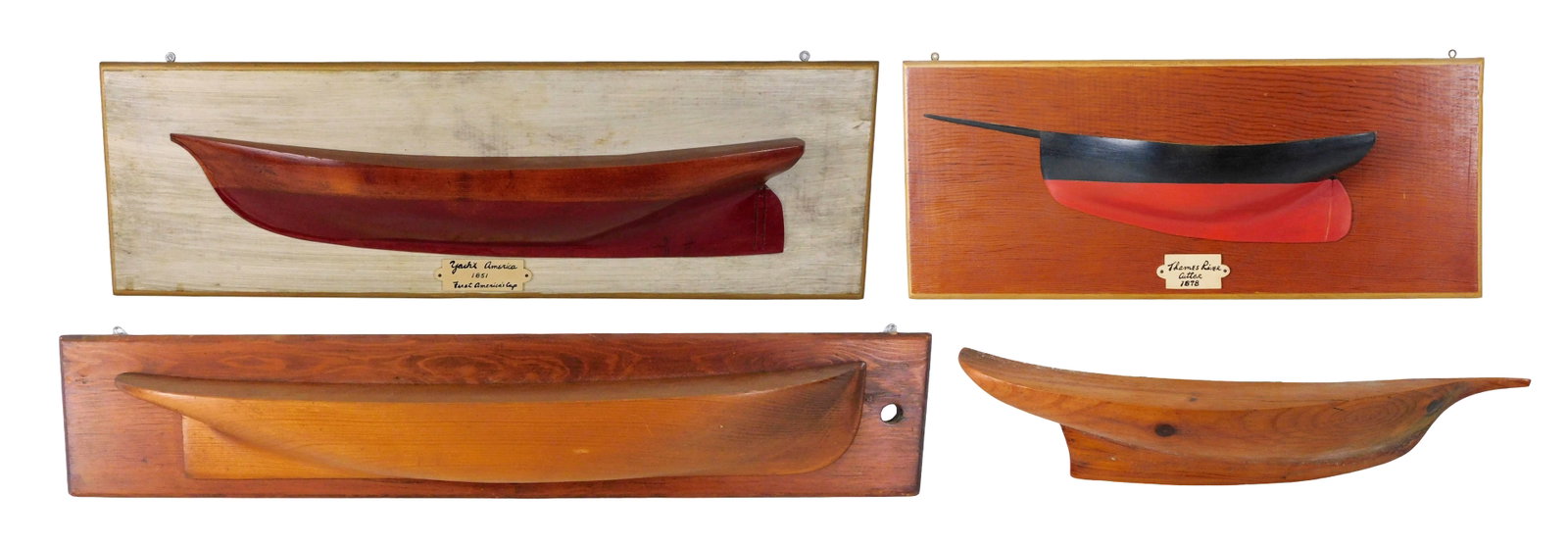 Four 20th C. half hull models, three mounted on board: largest titled "Yacht America, 1851, First: Four 20th C. half hull models, three mounted on board: largest titled "Yacht America, 1851, First America's Cup", red and clear hull, support board with thin layer of white paint, board: 24" l.; secon