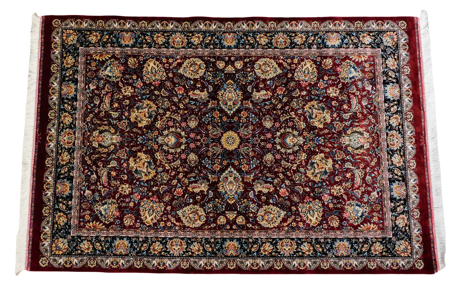 RUG: Silk Qum, 3' 4" x 5' 1", deep red ground, midnight and off-white accents, allover floral: RUG: Silk Qum, 3' 4" x 5' 1", deep red ground, midnight and off-white accents, allover floral design, signed, wear consistent with age and use including wear to fringes.