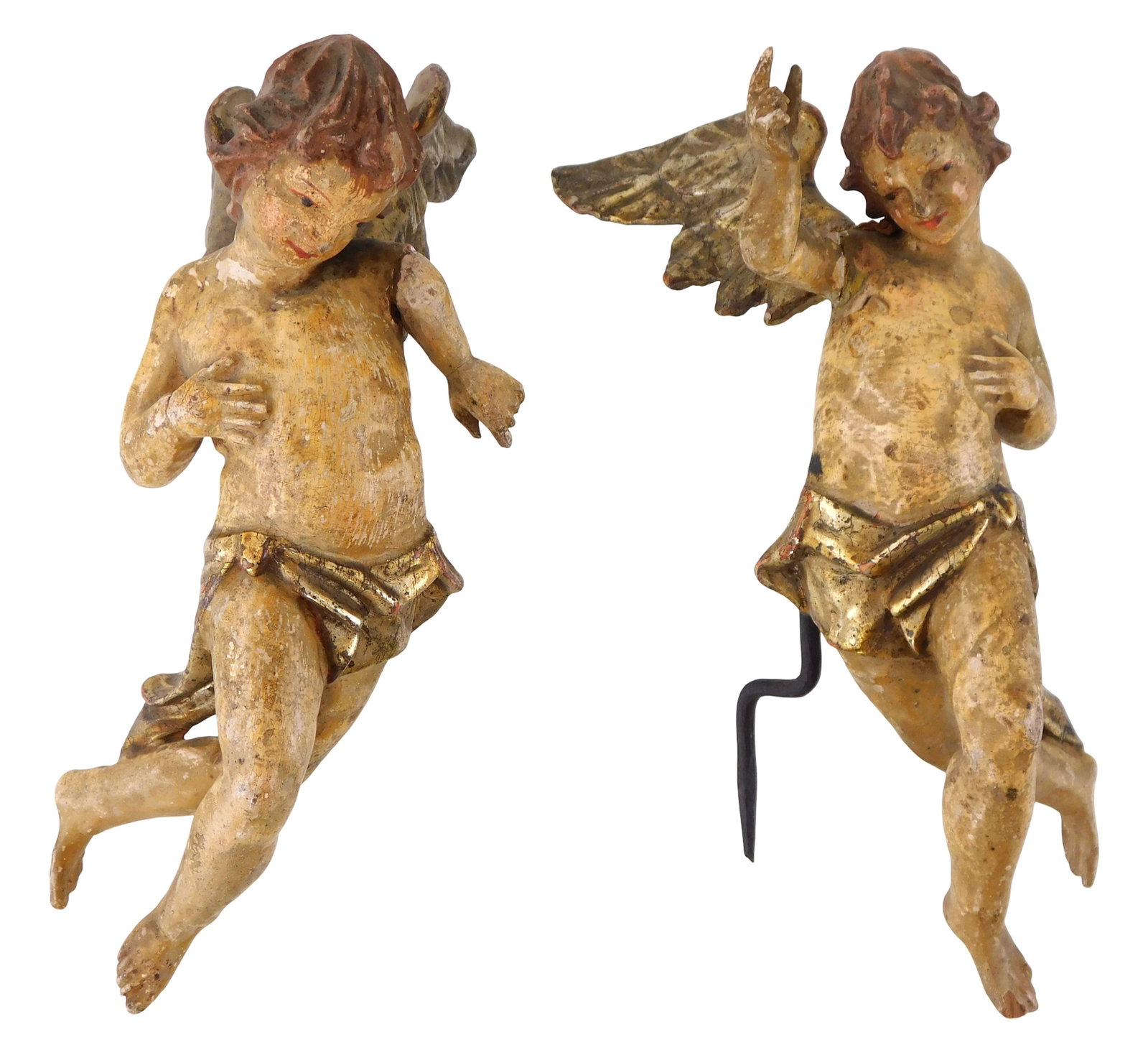 +Italian pair of cherub statuettes, likely 18th C., carved wood with gilt and painted plaster, gilt: +Italian pair of cherub statuettes, likely 18th C., carved wood with gilt and painted plaster, gilt wings and drapings, polychrome painted body, mirrored design, both on stakes for mounting, wear cons