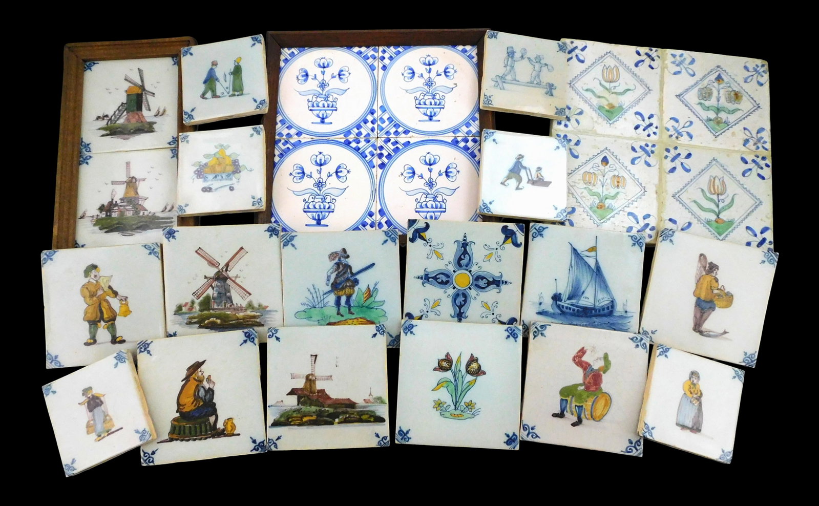 Hand-painted Dutch tiles, nineteen pieces, mostly 20th C., all hand-painted with figural, still life: Hand-painted Dutch tiles, nineteen pieces, mostly 20th C., all hand-painted with figural, still life and landscape decorations, three groups framed for hanging, most without signatures/ maker's marks,