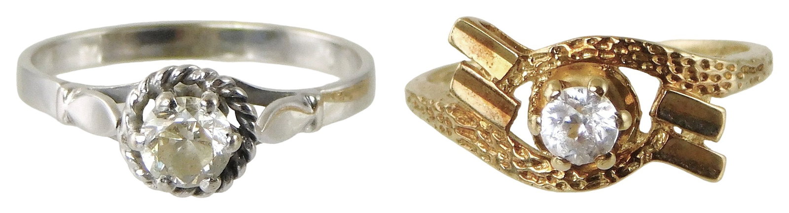 JEWELRY: Two 14K gold rings: one white gold with six-prong crown, set with one round brilliant cut (1 of 3)