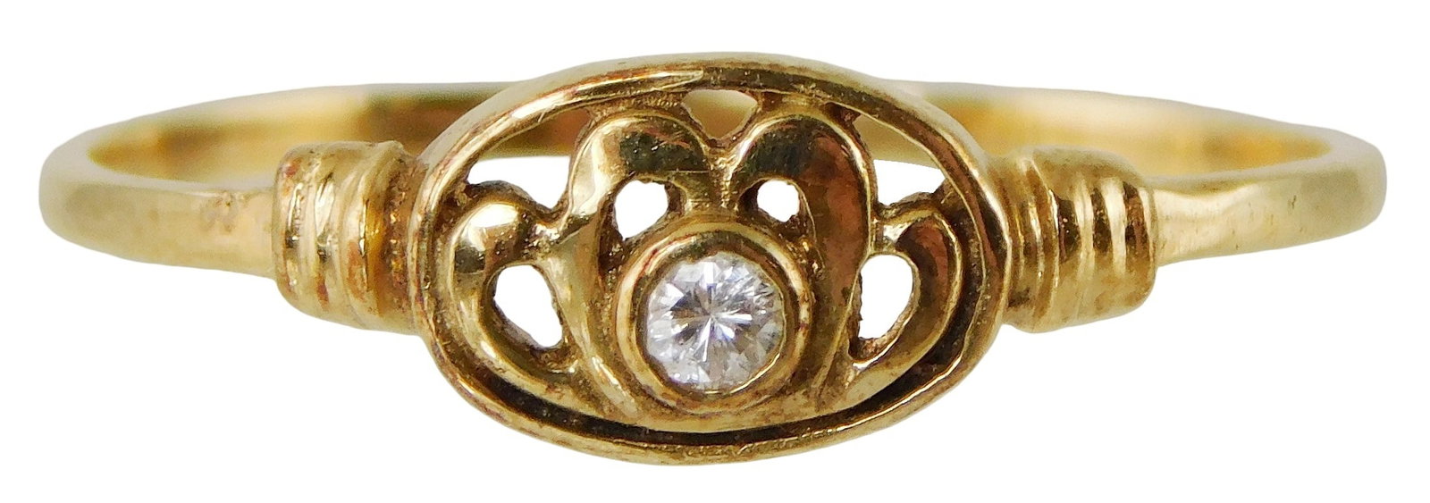 JEWELRY: 14K and diamond ring, pierced oval top with bezel set round brilliant cut diamond,: JEWELRY: 14K and diamond ring, pierced oval top with bezel set round brilliant cut diamond, hallmarks including "AV" and "14K", approximately 0.04 ct. [Total weight including stone: 1.3 grams].