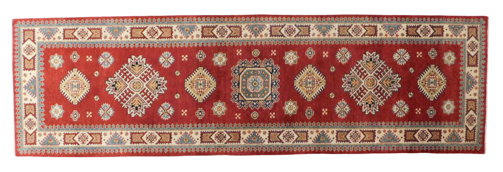 RUG: Uzbek Kazak runner, 2' 10" x 9' 9", wool on cotton, red ground, tan border, blue accents, three (1 of 2)