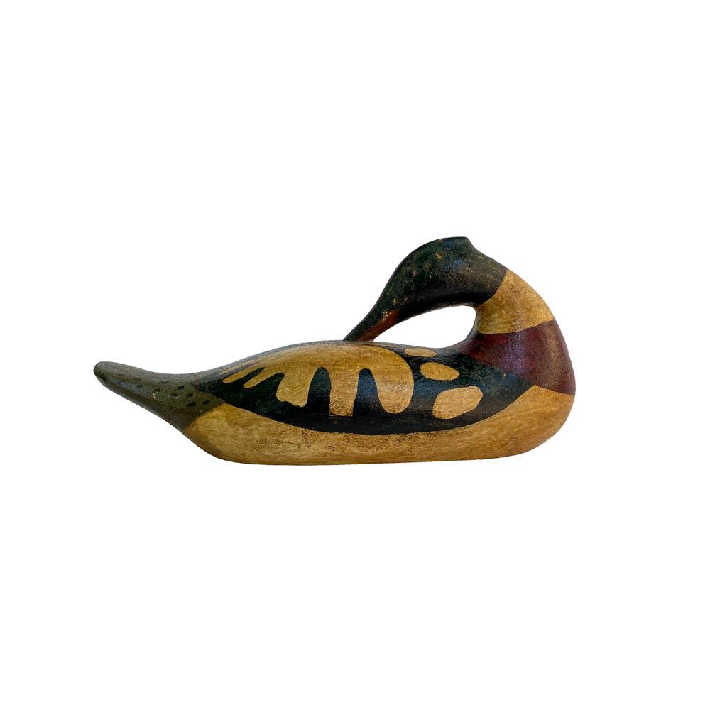 Miniature Preening Merganser by Frank Finney: Finely carved and painted with glass eyes and lead plate on the underside, unsigned, 3 x 6 inches.
