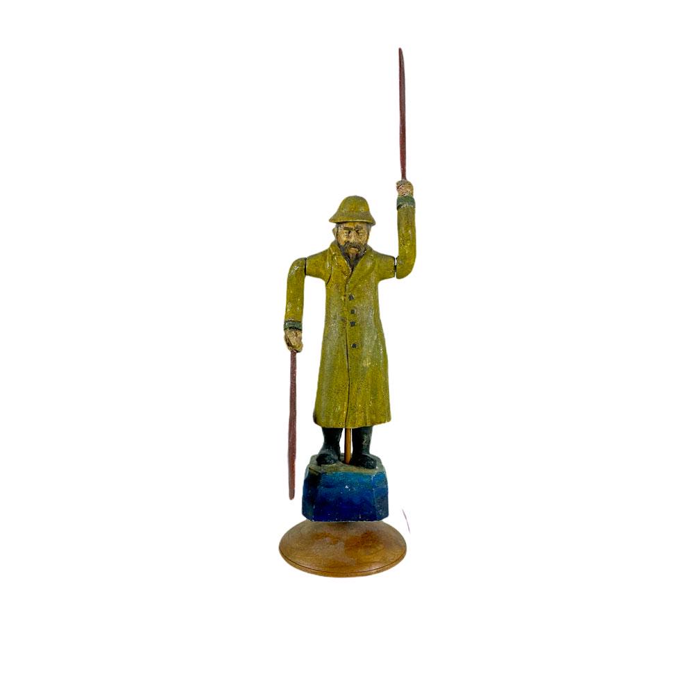 Old Salt Whirligig: Bearded fisherman whirligig with red painted paddle oars on a circular turned stand, original paint with crazing of the paint, 13.5 inches Height to tip of oar, American, c. 1950