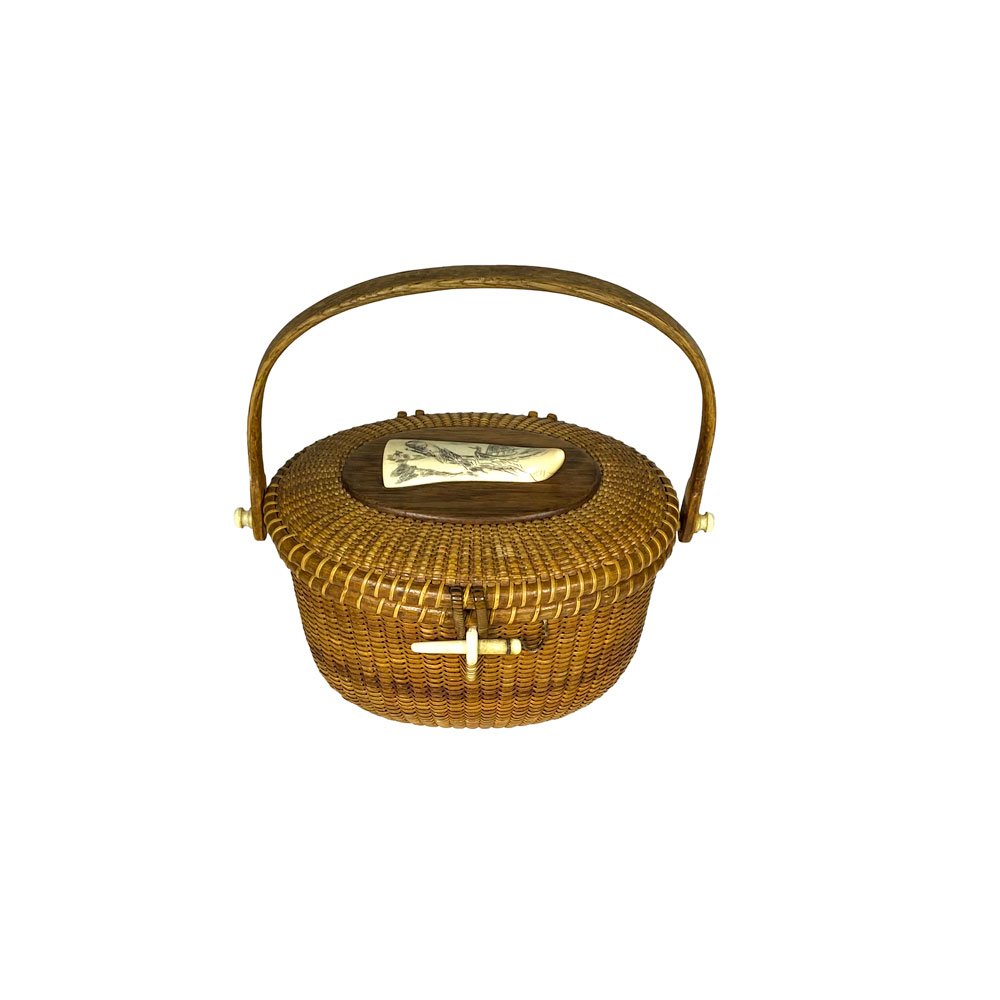 Nantucket Basket Purse by Stephen Gibbs,: 9" Oval Nantcket friendship basket with Rosewood plaque mounted with an engraved scrimshaw whale tooth by Paul Morris (1893-1984) . Stamped on bottom and dated 1967. Made by Stephen Gibbs (1896-1974)7