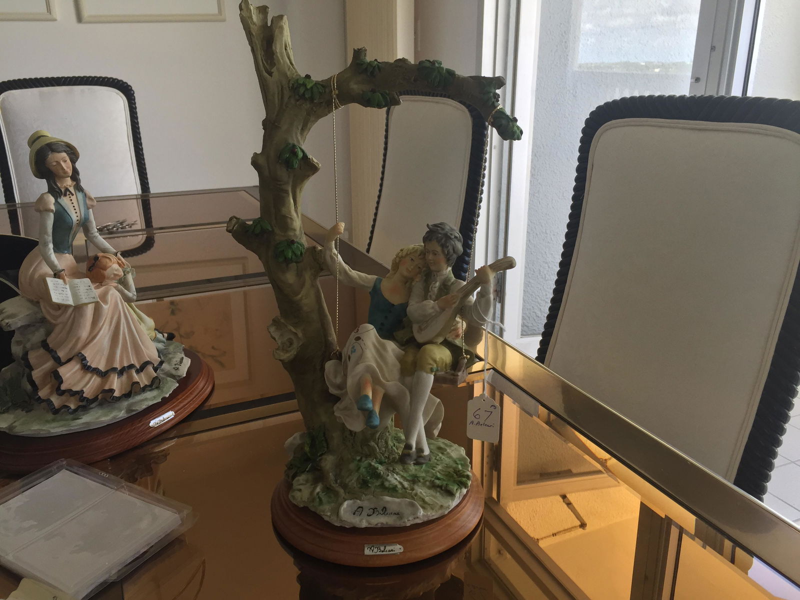 Porcelain: VINTAGE CAPODIMONTE A BELCARI BISQUE PORCELAIN COUPLE ON TREE SWING' 17"h x 9"w Consigner PS