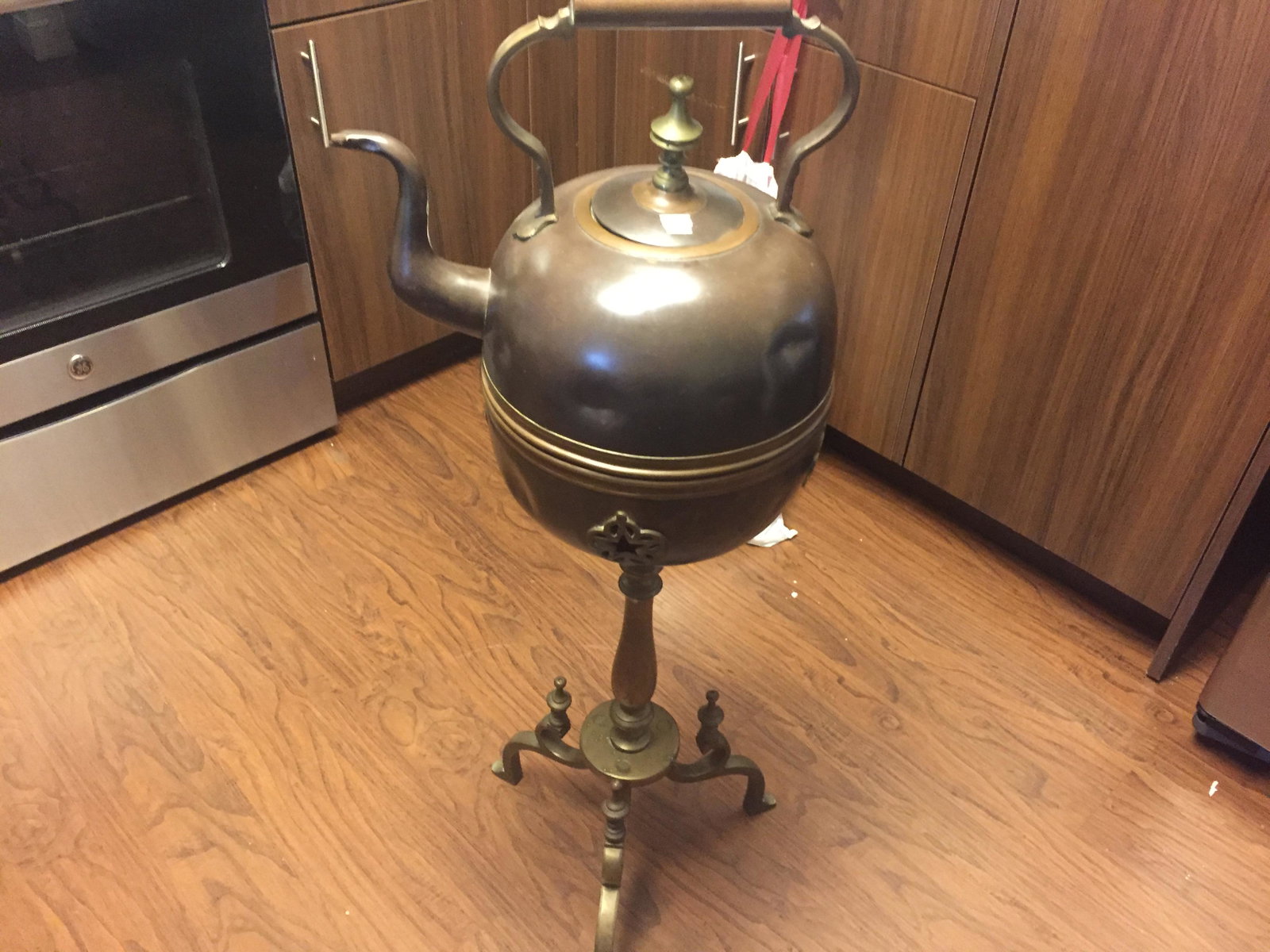 BRONZE & COPPER: COPPER TEA POT ON BRONZE STAND 41"h x 11"dia.