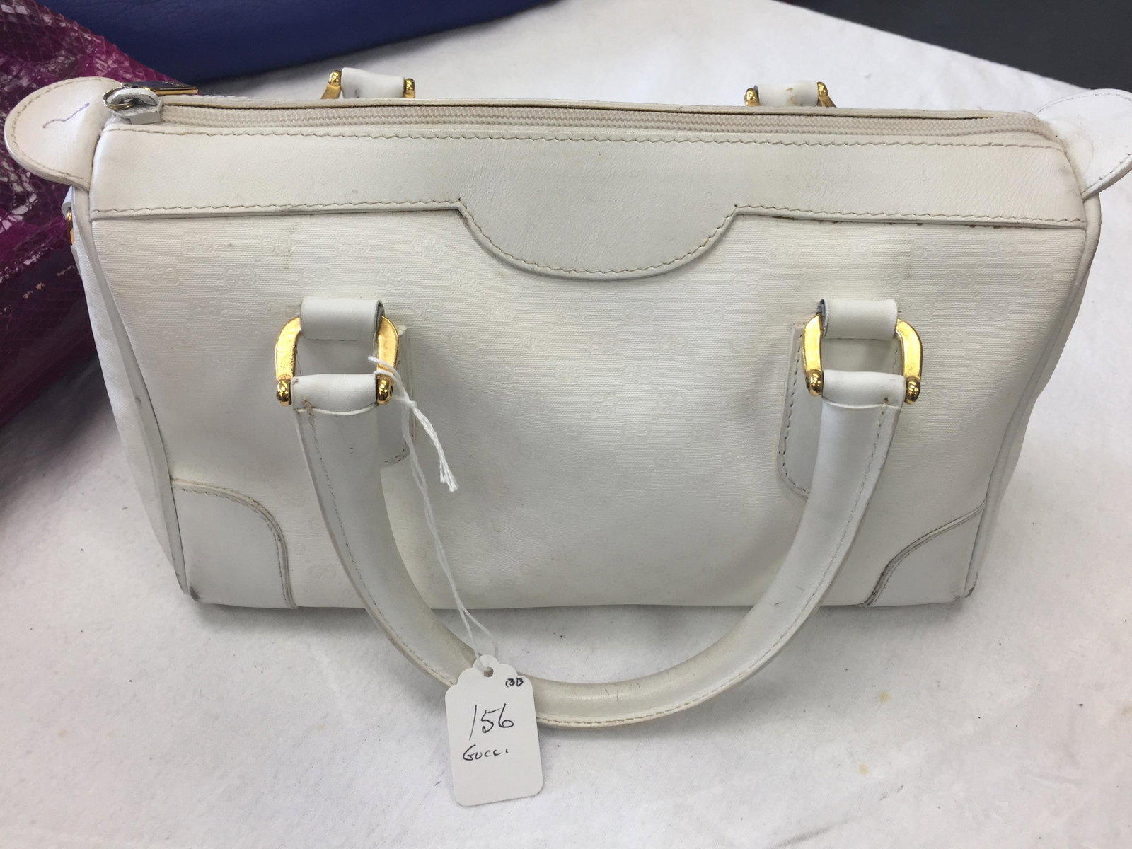 Gucci Handbag: Gucci White Handbag (no marks on bag but, has Gold Metal Gucci Tag)