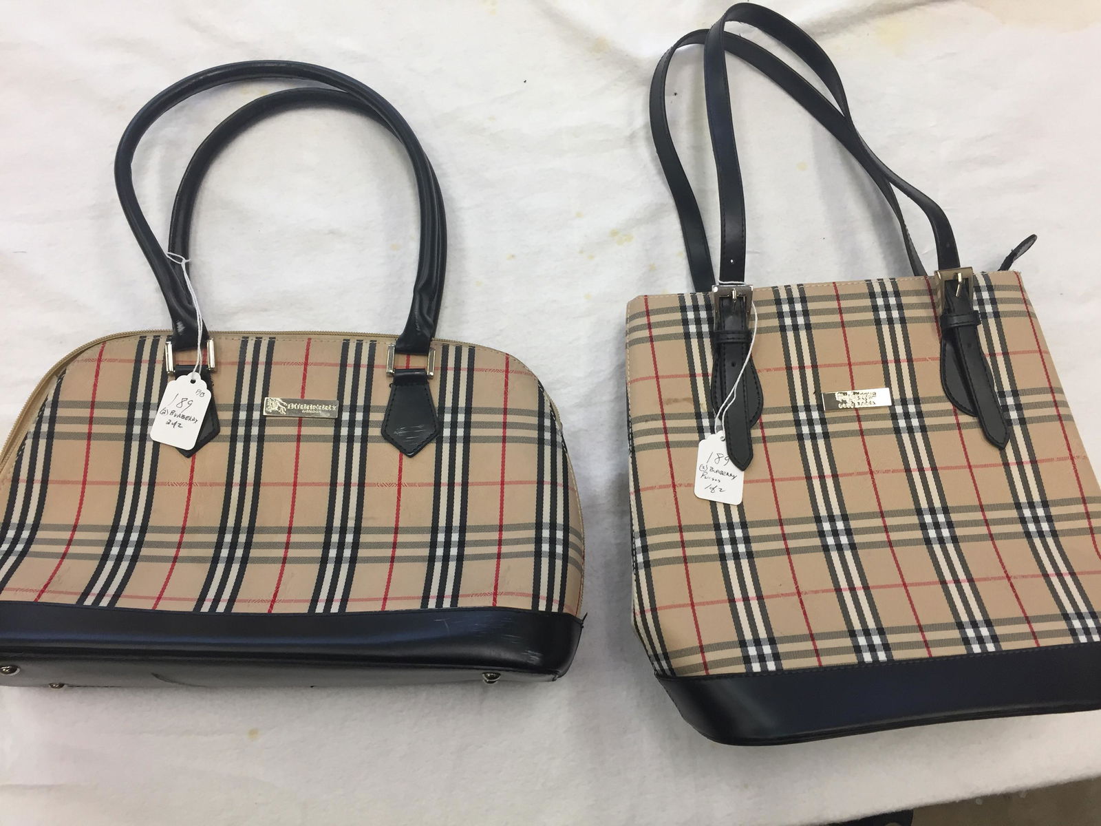 Designer-Burberry: (2) Burberry Handbags (large bag in good cond. & small bag in fair)