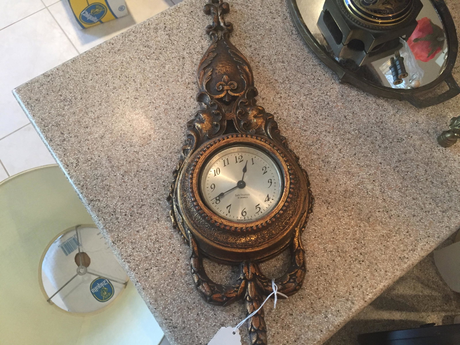 Clocks: Seth Thomas, 4-Jewel, Gold Metal Wall Clock (wound tight)