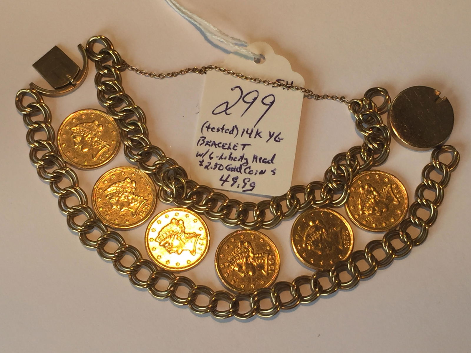 Jewelry: 14K YG (acid tested) 6-Liberty $2.5D Coin Bracelet, 49.9g (1617md)