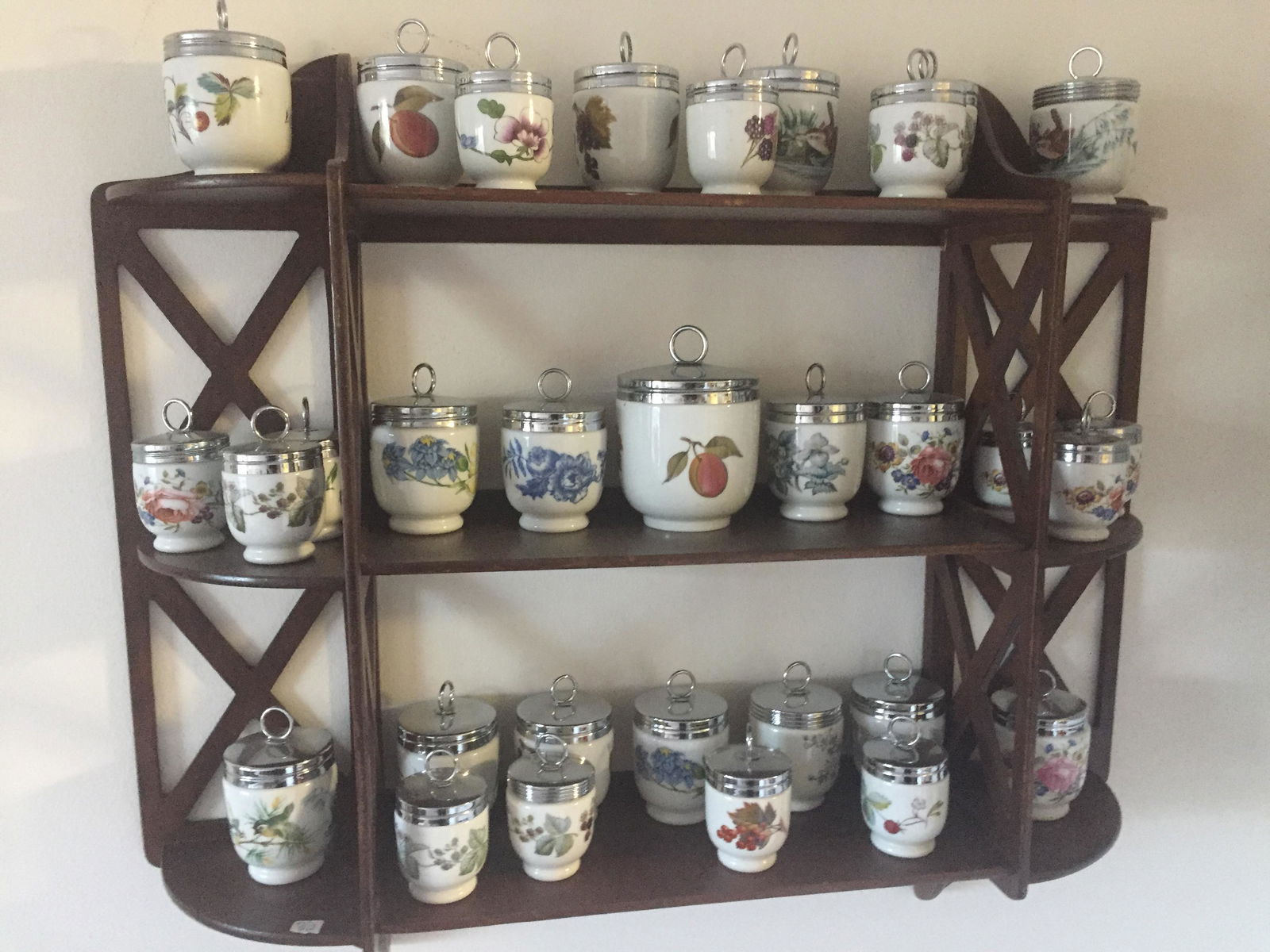 Wall Shelf Full of Egg Coddlers (1 of 6)