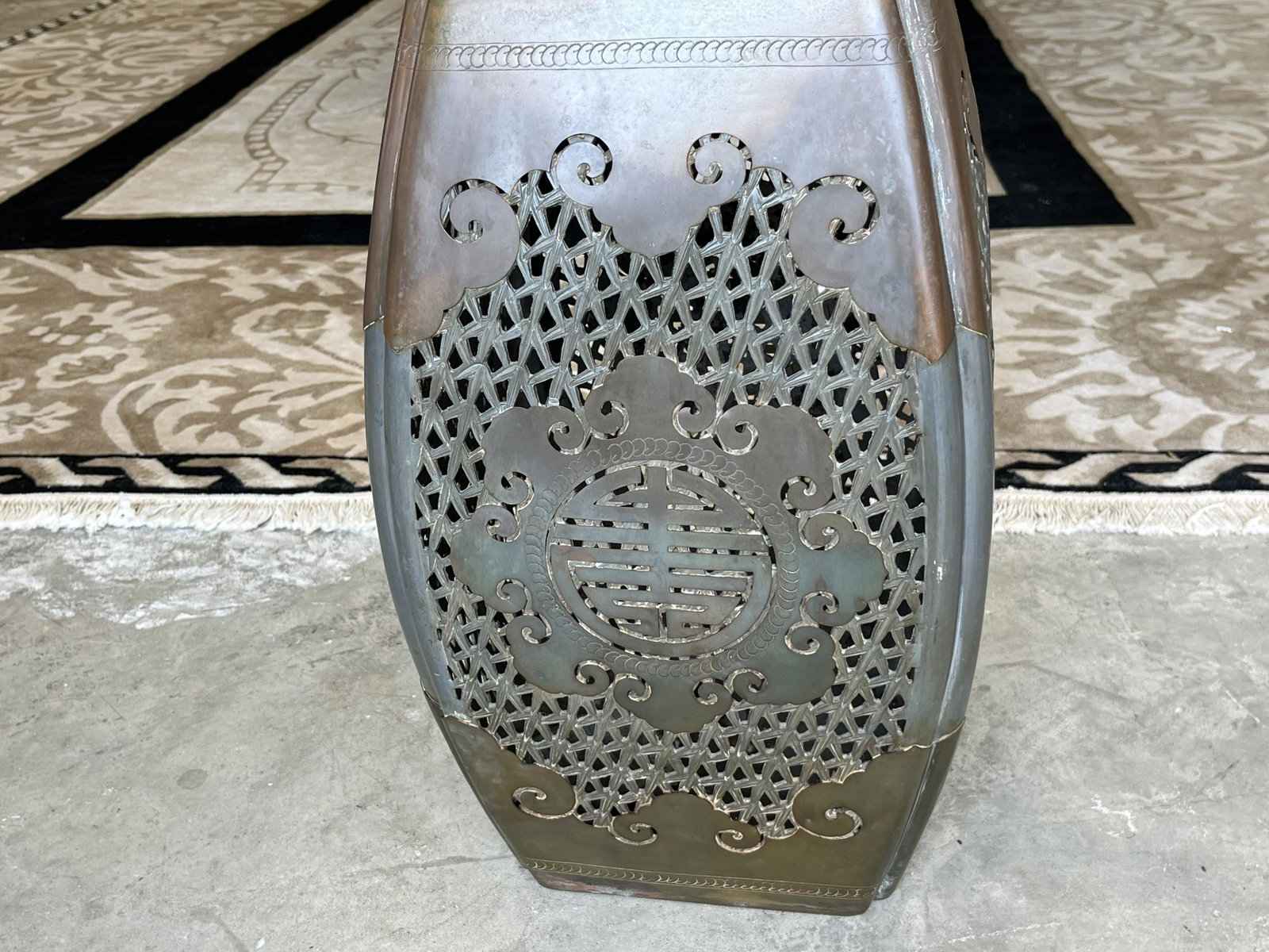 Antique Pewter & Brass Chinese Garden Stool: Correction: After we cleaned it we found this ia an Antique Chinese Garden Stool. 19x12sq. It's Bronze, Trimmed with Brass. One side has a slight bow inward. If it didn't have the flaw, it would be wo