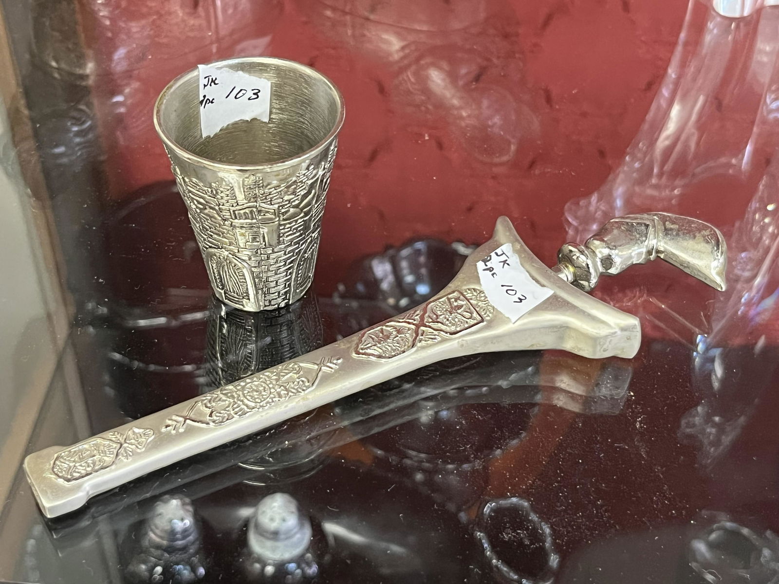 Kiddush Cup & Keris: 2-Completely different items. Traditional Shabbat 2"h Kiddush Cup with Engraved Wailing Wall-Jerusalem & The 675" Keris is a dagger native to the Malay Archipelago in South-East Asia. It can be found