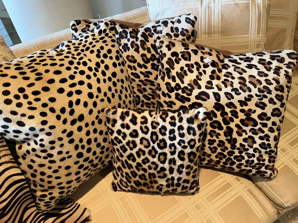 4-Animal Skin Pillows: 4-Animal Skin Throw Pillows (smallest on has sm. Tear)