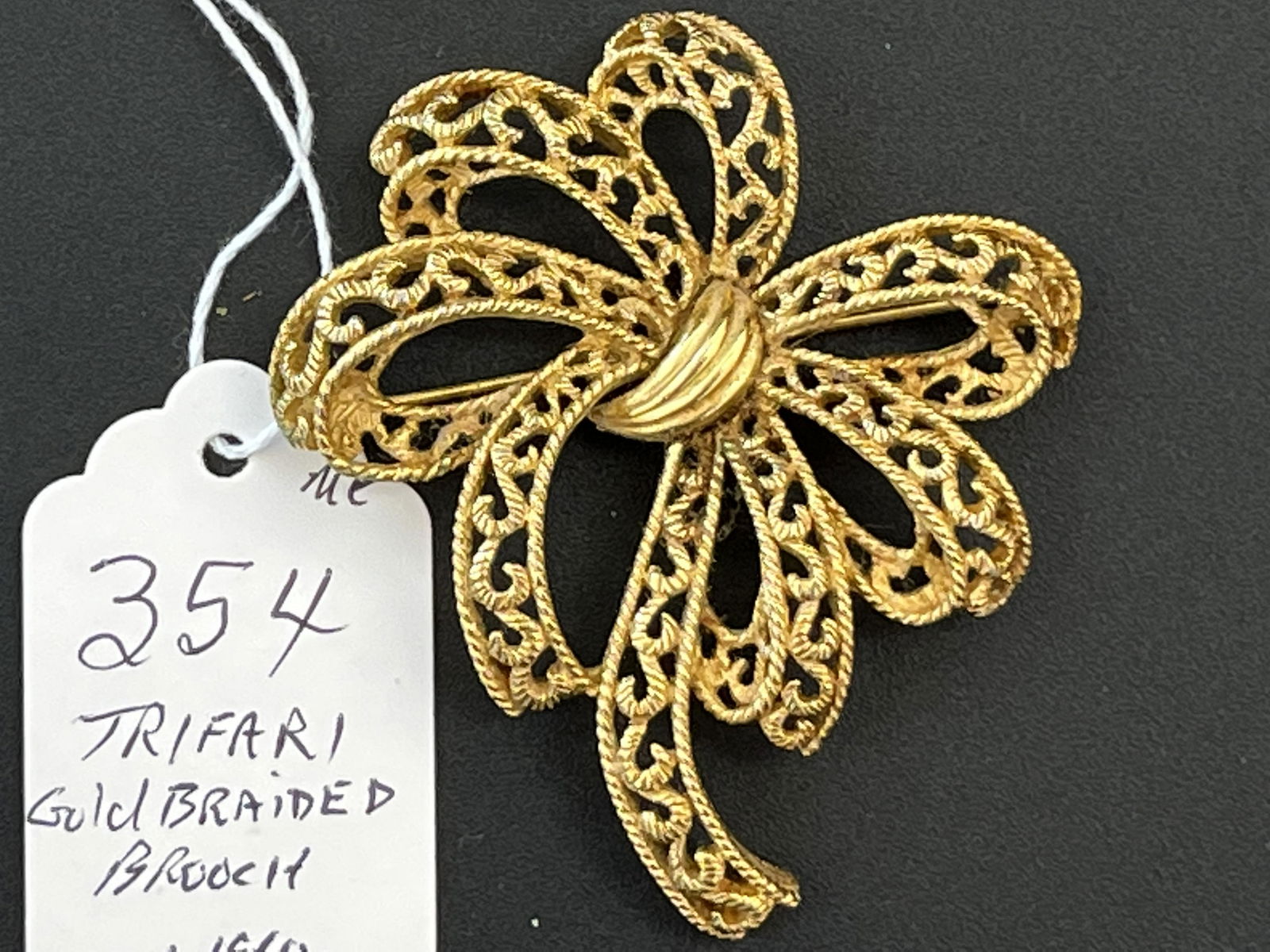 TRIFARI Gold Ribbon Pin: Vintage TRIFARI Gold Braided Ribbon Pin c.1960's