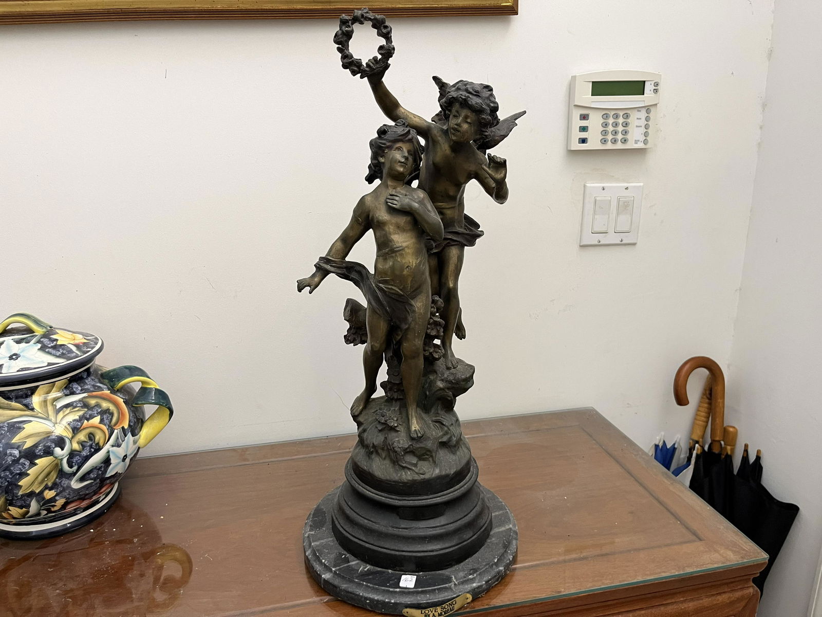 Auguste Moreau, Bronze: Bronze, 26.5"h, "Love Song" by Auguste Moreau, the third son of sculptor and painter Jean Baptiste Moreau, Auguste initiated himself to sculpture along with his older brother Mathurin. In 1861, he mad