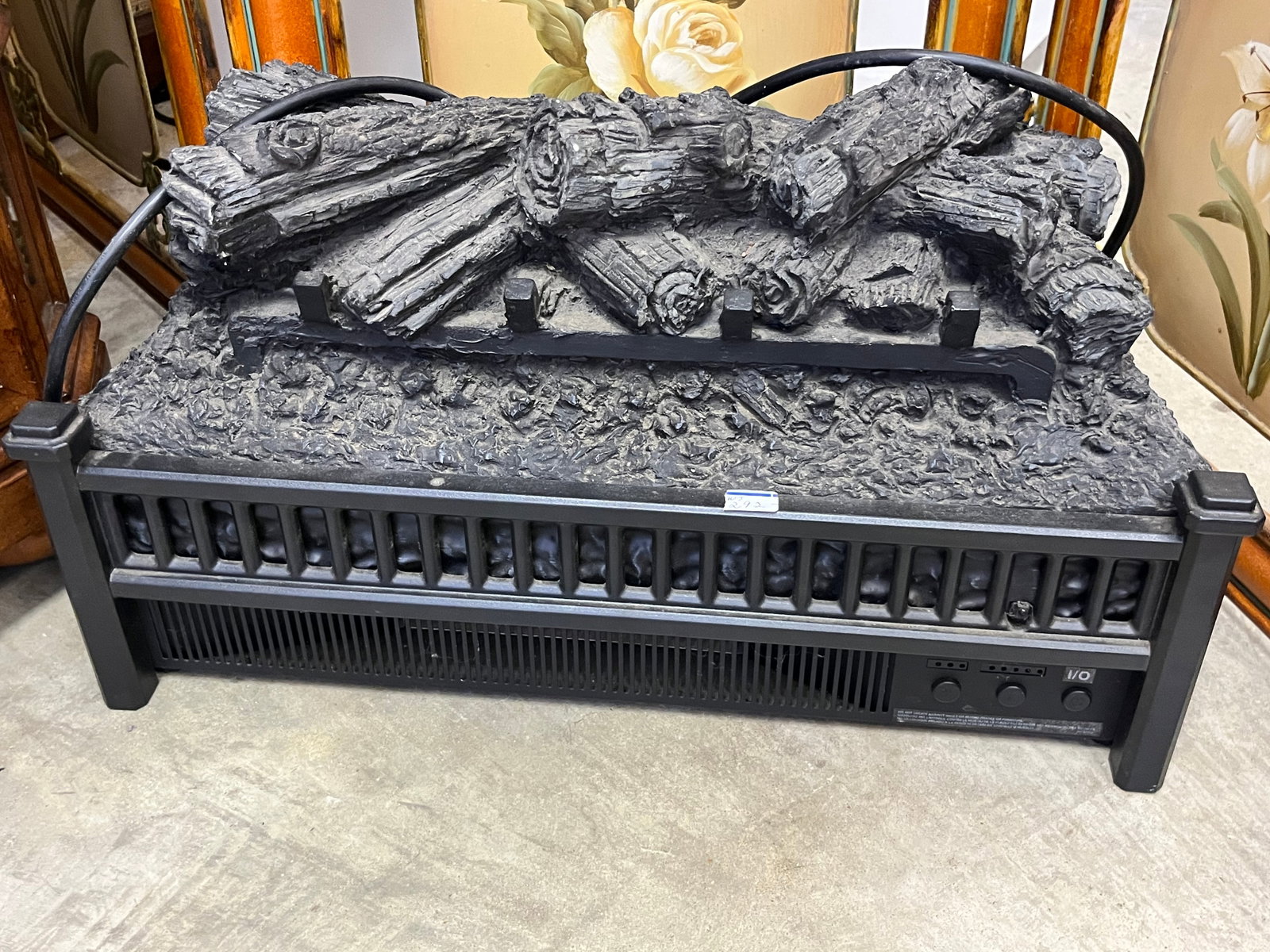 Elec. Log Heater: Electric Log Heater that Glow/Flickers like flames, varible heat & fan controls.