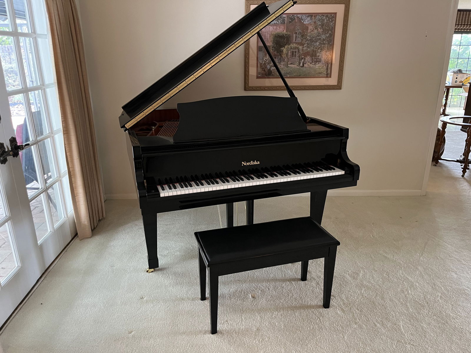 Nordiska 5' Baby Grand Piano: Black 5' Nordiska Baby Grand Piano with piano bench