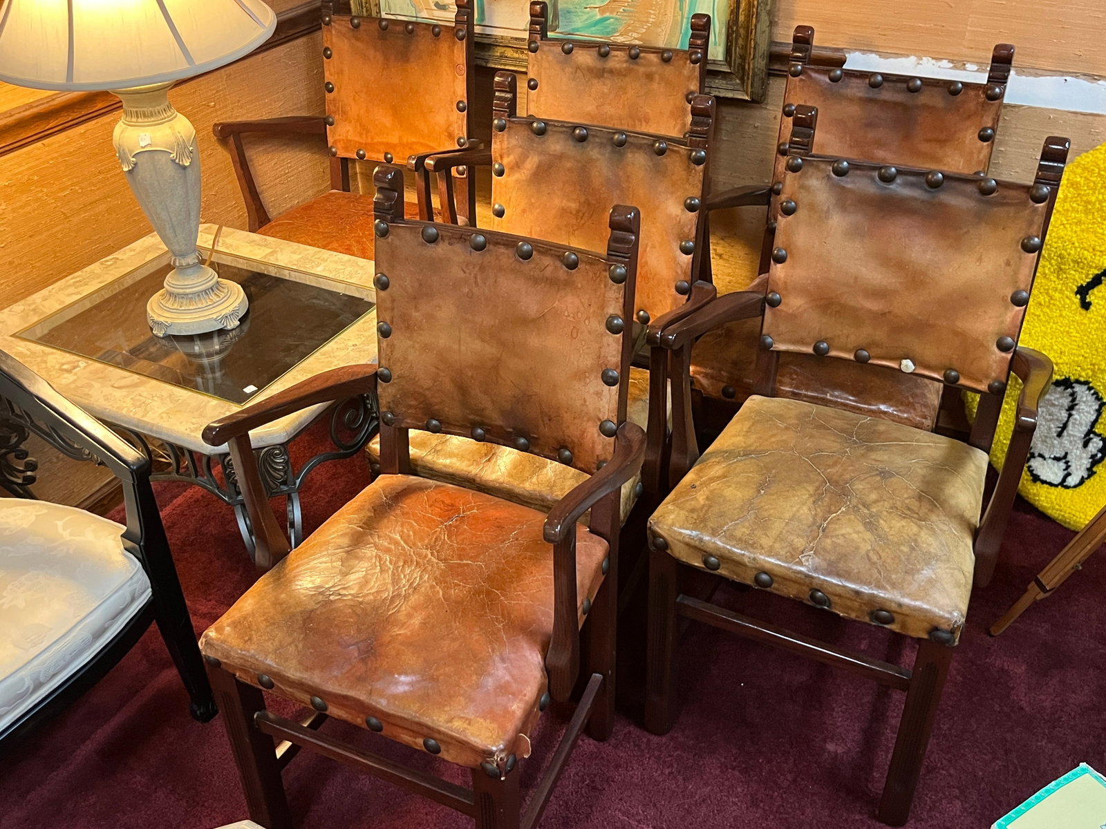 (6)Antique Spanish Leather Chairs: (6) Antique Spanish Leather Arm Chairs (crack in leather seat)