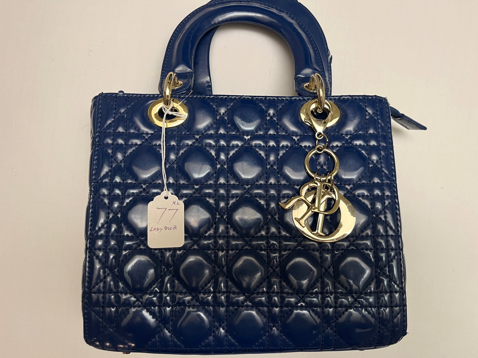Lady Dior Midnight Blue Handbag: Med Lady Dior Pastel Midnight Blue Iridescent Handbag ( really feel this is a knockoff, so buyer beware) I also see some peeling.