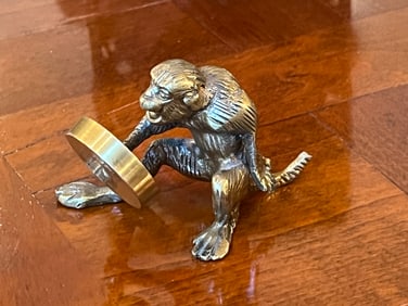 Bronze Monkey Looking at Mirror