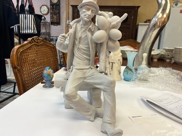 Porcelain Man Holding Balloons, 14h x 8w x 7d Spain