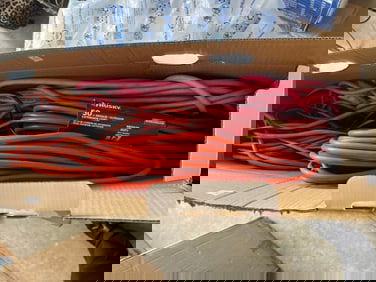 BOX FULL OF EXTENSION CORDS