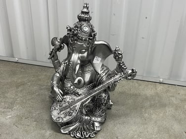 Lord Ganesha Playing a Musical Insturment
