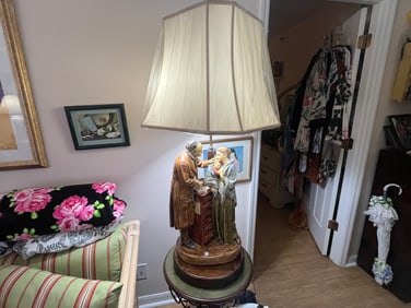 'The Charity Patient' Sculpture on Lamp Stand
