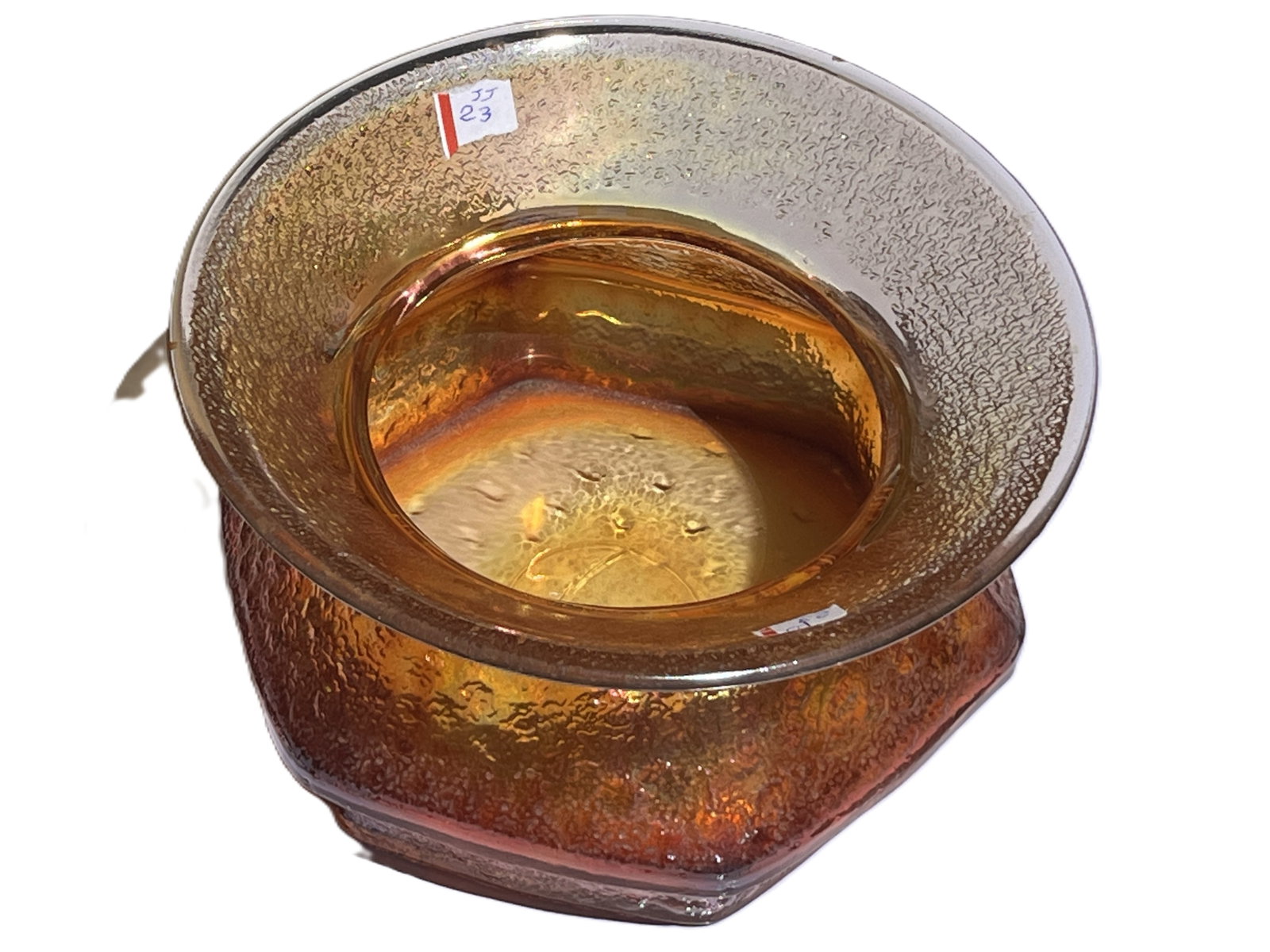Mid‑Century Iridescent Amber Art Glass Bowl: A striking mid‑century art glass bowl featuring rich amber coloration with a luminous iridescent surface that shifts in light. The textured exterior and gently flared rim create a sculptural for