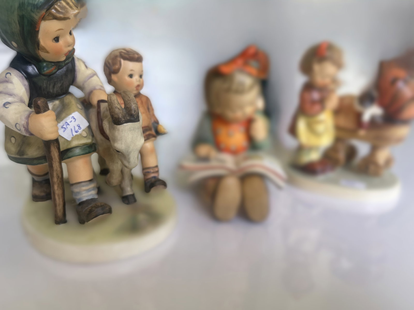 Set of Three Vintage Goebel Hummel Figurines – “Goat Herder,” “Story (1 of 4)
