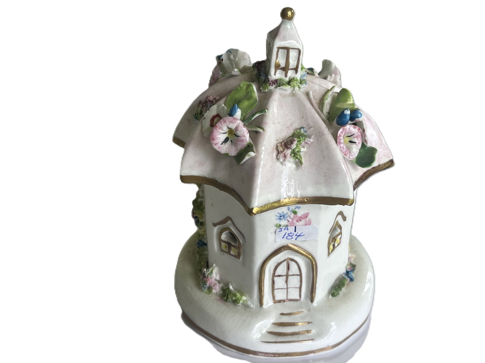 Antique Porcelain Floral Cottage Pastille Burner, c.1850: A charming hand‑modeled porcelain cottage pastille burner featuring a domed roof with raised floral garlands and gilt detailing. The soft pink roof and white body are accented with delicate hand