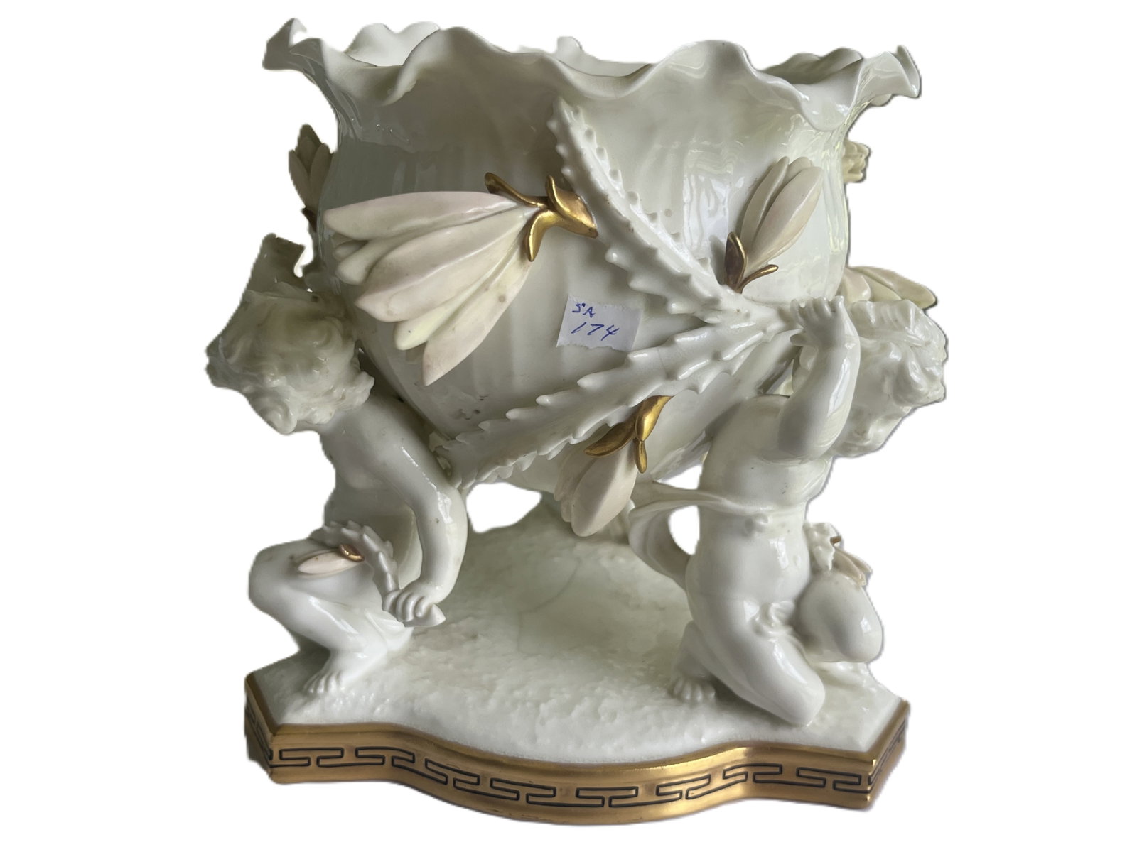 Meissen-Style Porcelain Figural Vase with Cherubs and Floral Motifs: Exquisite hand-painted porcelain vase featuring three cherubic figures supporting a ruffled bowl embellished with sculpted lilies and gilt highlights. The base is trimmed with a Greek key border in go