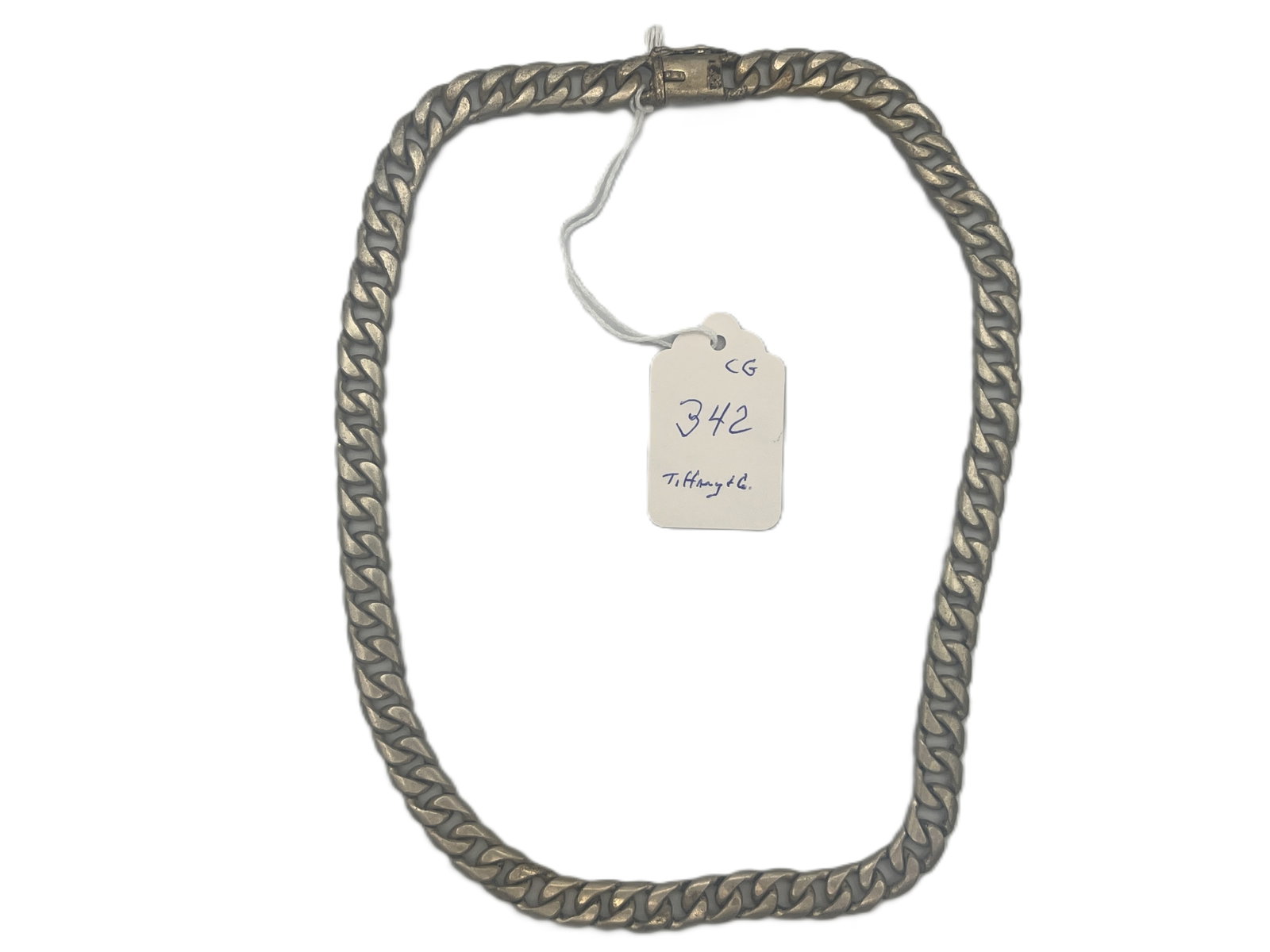 Tiffany & Co. Sterling Silver Curb-Link Necklace, Paris Marked, 2.608ozt: A substantial Tiffany & Co. sterling silver curb-link necklace, marked “Tiffany & Co. / Made in Paris / 925” on the clasp. The piece exhibits classic mid-century styling with heavy interlo