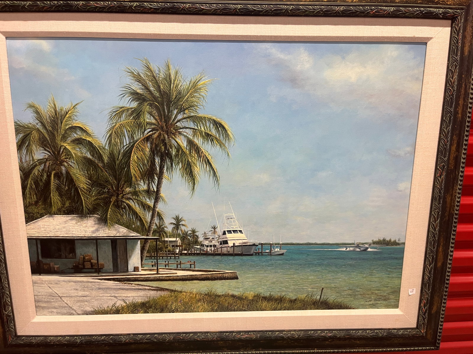 Tripp Harrison Coastal Marina Scene Original Oil on Canvas (26" x 36") Born-1964: Original oil painting by noted Florida artist Tripp Harrison, depicting a tranquil marina scene with palm trees, docked yachts, and a waterfront cottage under a bright tropical sky. Harrison's signatu