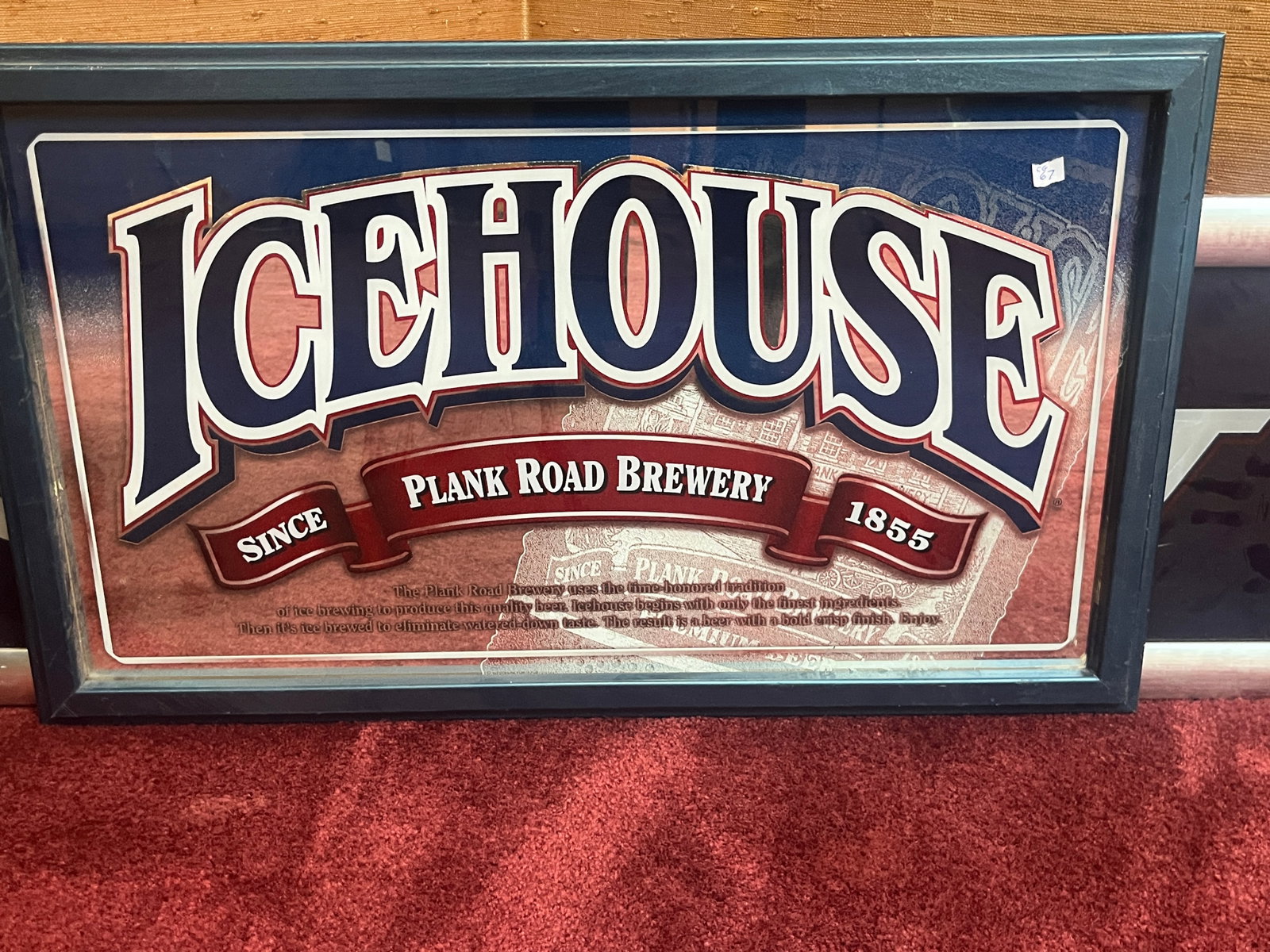 Vintage Icehouse "Plank Road Brewery Since 1855" Framed Advertising Mirror, 16.5 x 28 In.: Vintage Icehouse beer advertising mirror featuring the bold "Icehouse" logo above the "Plank Road Brewery Since 1855" banner. Housed in a black finished wood frame with glass front. Produced as promot