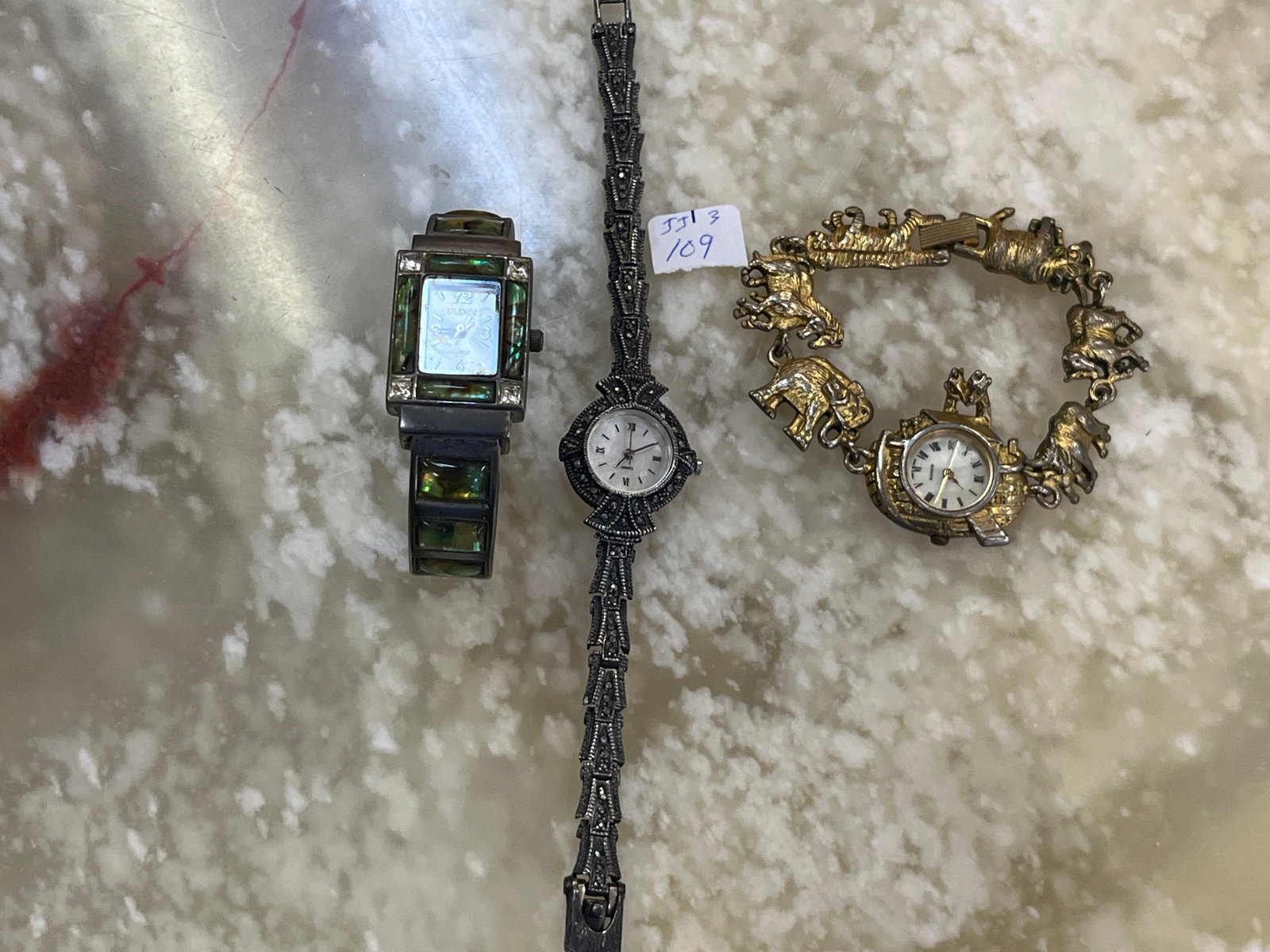 Bag Lot-3-VTG Watches: A Studio?style quartz watch featuring a textured graiffe?patterned frame, iridescent abalone shell inlay panels, and rhinestone accents ? a bold, artisan look with strong visual presence. A silver?ton