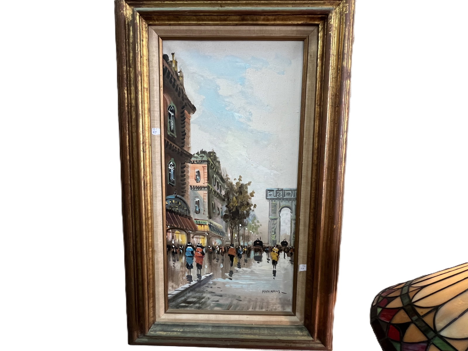 French School Oil on Canvas Paris Street Scene, Signed LR Marchand, 24 × 12 in.: Lively mid?20th?century Parisian street scene rendered in oil on canvas, depicting pedestrians, horse?drawn carriages, and architectural elements under warm city light. Strong impressionist brushwork 