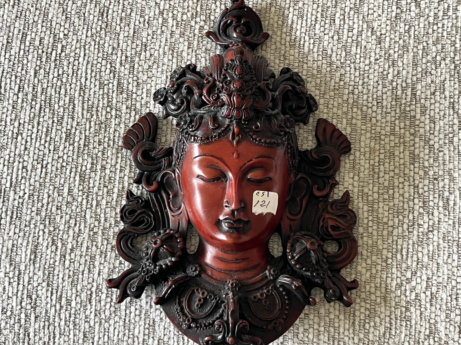 Handcrafted Goddess Tara Mask wall hanging sculpture with a polished reddish brown finish. (1 of 2)