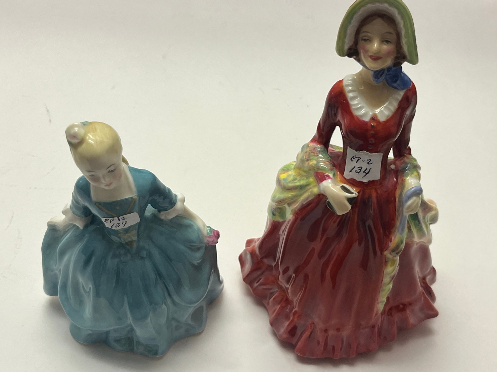 Two Royal Doulton Figurines: "A Child from Williamsburg" HN2154 & "Sabbath Morn" HN2487
