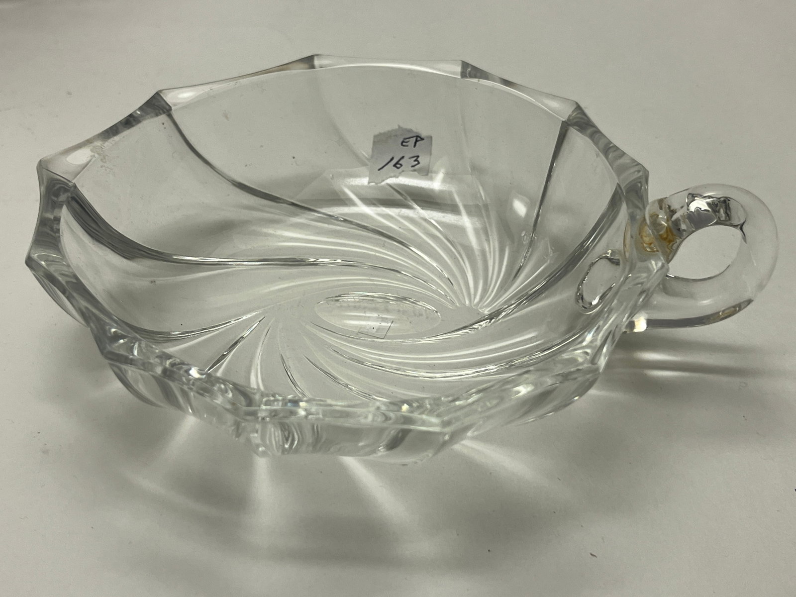 Val Saint Lambert Belgian Crystal Handled Bonbon Bowl, Signed, 8.5"W: Signed Val Saint Lambert heavy Belgian lead crystal handled bonbon or serving bowl. This elegant modernist design features a sculptural spiral (torsade) pattern flowing into a faceted octagonal rim wi