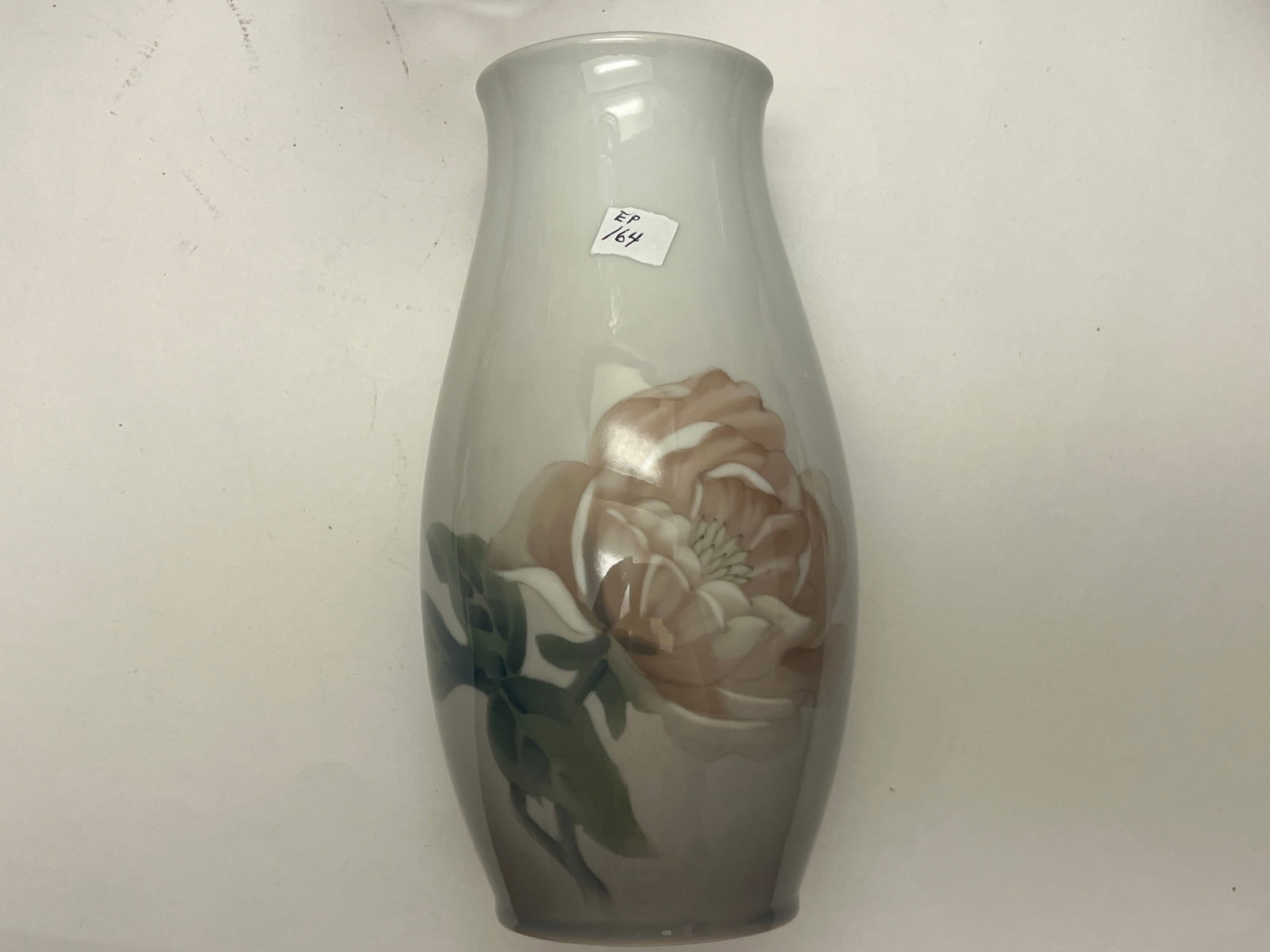 Bing & Grøndahl (B&G) Danish Porcelain Peony Vase, 9"H: Elegant Bing & Grøndahl (B&G) hand-painted porcelain vase, 9 inches high, decorated with a large blooming peony in soft shades of blush, cream, and green against a satin gray glazed ground. The under