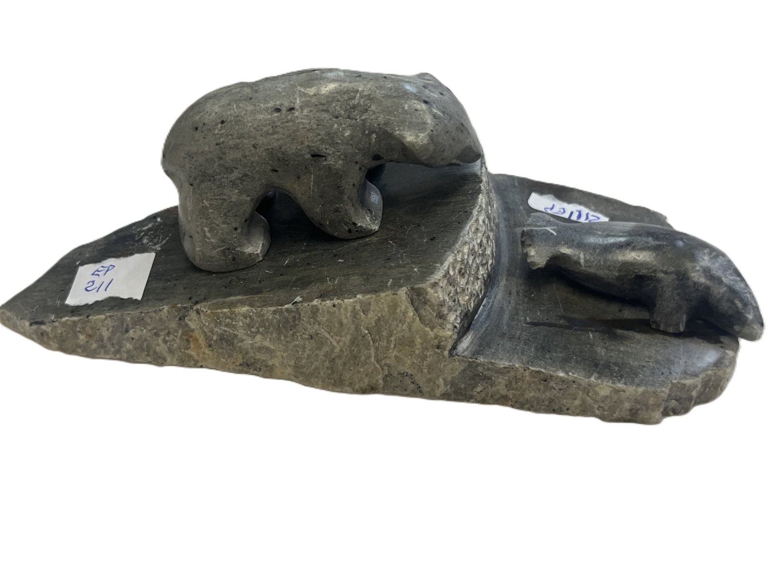Polar Bear & Seal Marble Sculpture, Ben Soolomona Alaskan Carved Stone Polar Bear & Seal Sculpture,: Vintage Alaskan hand-carved stone sculpture depicting a polar bear overlooking a seal, arranged on a tiered integral stone base. The figures are rendered in simplified, rounded forms with smoothly wor