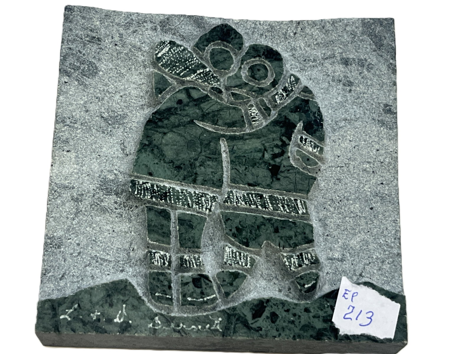David Bernett Canadian Marble Inuit Lady Sculpture Plaque, 4 x 4 x .75 in.: Vintage Canadian carved and inlaid marble sculpture plaque by David Bernett, depicting a stylized Inuit woman in traditional Arctic clothing. The figure is executed in contrasting shades of green and 