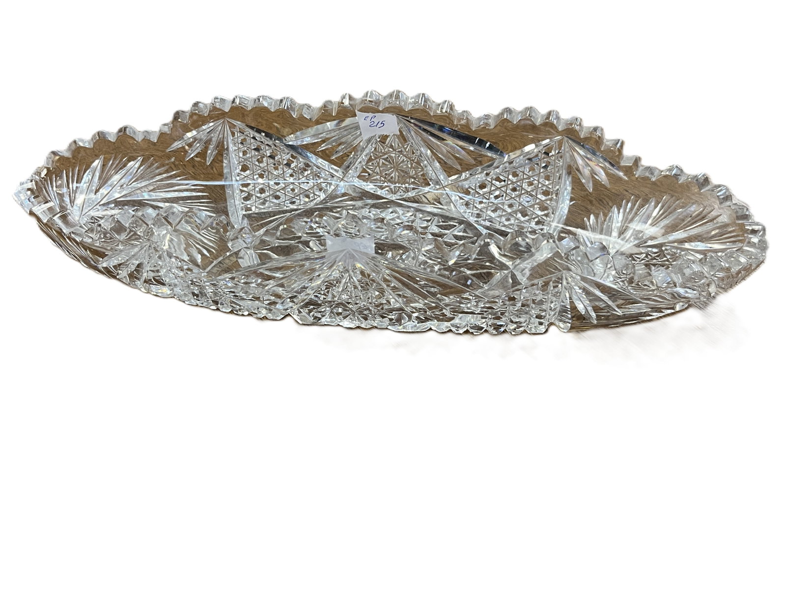Vintage Brilliant Style Cut Crystal Oval Celery Relish Bowl, 2.5 x 12 x 4 in.: Vintage oval cut crystal celery or relish bowl featuring an elaborate American Brilliant-style geometric pattern. Heavily cut decoration includes hobstar and starburst motifs, crosshatched diamonds, r